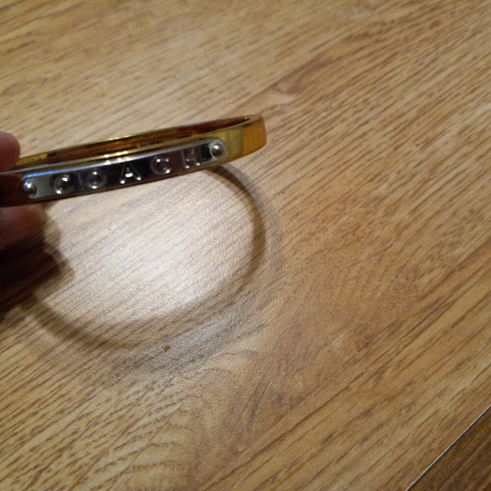 AUTH Coach Hinged Bangle Bracelet Gold Tone with Silver "Coach" Logo Name Plate